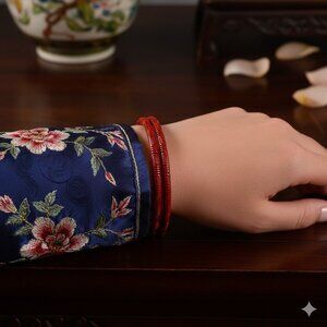 Vintage Set of 2 Chinese Cinnabar Bangle Bracelets Red Carved Geometric